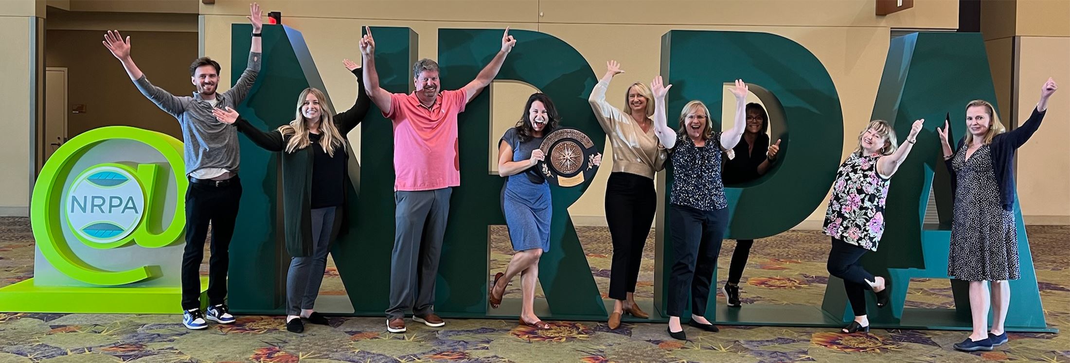 The Community Services team celebrate their award as one of the best park systems in the country in 